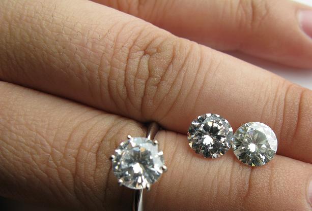 It is a comparison from left to right of a cz asha and moissanite